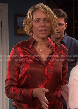 Nicole's red floral blouse on Days of our Lives