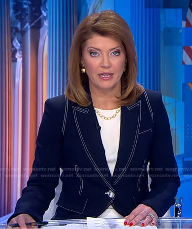 Norah’s navy blazer with white stitching on CBS Evening News