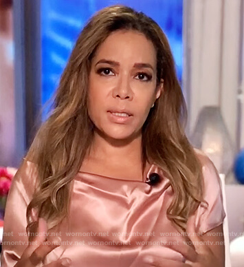 Sunny’s pink satin drape blouse on The View
