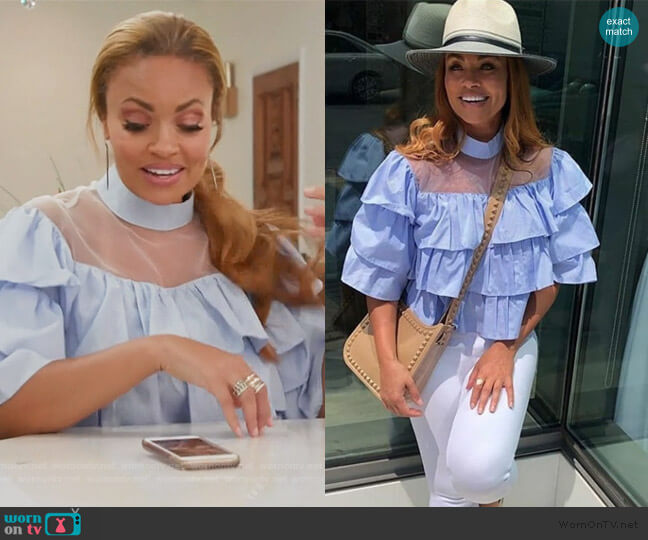 Blue Ruffle Blouse by Sevyn Stitches by KSW worn by Gizelle Bryant on The Real Housewives of Potomac