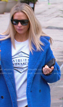 Dorit's white Atelier Versace sweatshirt and blue teddy coat on The Real Housewives of Beverly Hills