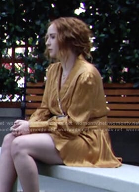 Mariah’s yellow satin wrap mini dress on The Young and the Restless