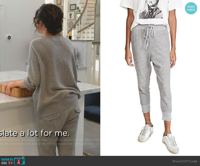 Selena Gomez's grey sweater and sweatpants and turquoise knife set