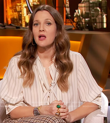 Drew’s striped tie neck blouse on The Drew Barrymore Show