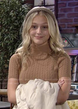 Faith's beige cable knit top on The Young and the Restless