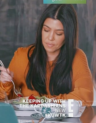 Kourtney’s orange ribbed sweater on Keeping Up with the Kardashians