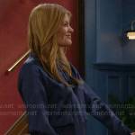 Phyllis’s navy blue fringed tie neck blouse on The Young and the Restless