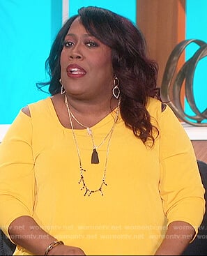 Sheryl’s yellow cold shoulder top on The Talk