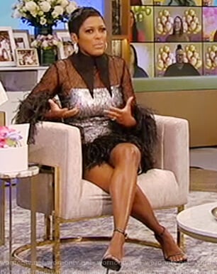 Tamron’s black feather trim mini dress on Tamron Hall Show