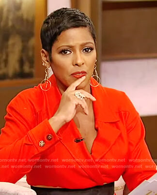 Tamron’s red belted jumpsuit on Tamron Hall Show