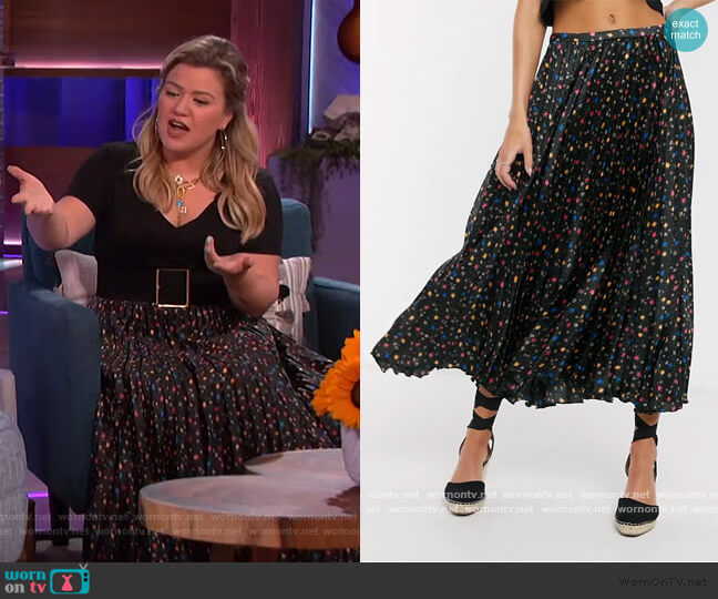 Satin Pleated Midi Skirt in lack based floral print by ASOS worn by Kelly Clarkson  on The Kelly Clarkson Show