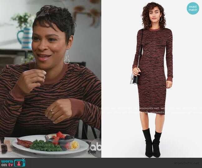 Negin Mirsalehi Fitted Tiger Print Midi Sweater Dress by Express worn by Angela (Carly Hughes
) on American Housewife