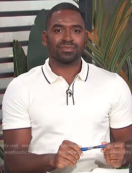 Justin’s white contrast trim polo on E! News Daily Pop