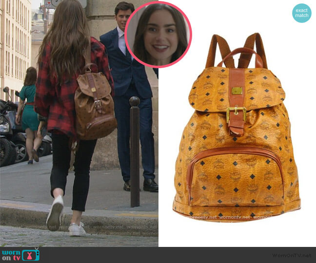 Logo Backback by MCM worn by Emily Cooper (Lily Collins) on Emily in Paris