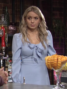 Abby's blue tie neck dress on The Young and the Restless