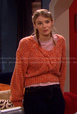Allie’s orange chunky knit v-neck sweater on Days of our Lives