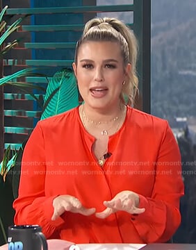 Carissa’s red surplice blouse on E! News Daily Pop