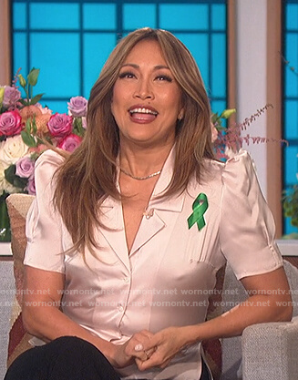 Carrie’s pink satin puff sleeve top on The Talk