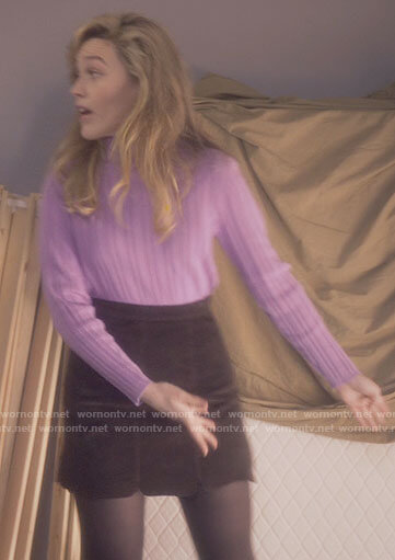 Dani’s pink turtleneck and brown suede skirt on The Haunting of Bly Manor