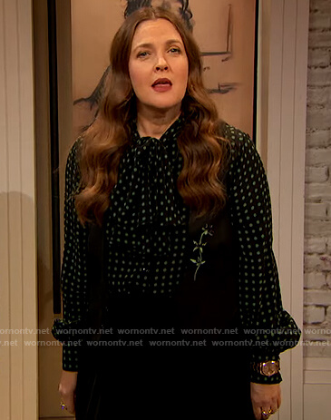 Drew’s black polka dot tie neck blouse on The Drew Barrymore Show