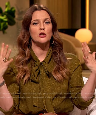 Drew’s green silk tie neck blouse on The Drew Barrymore Show