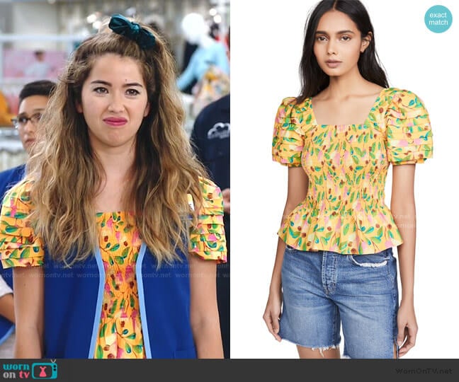 Cheyenne’s yellow floral smocked top on Superstore