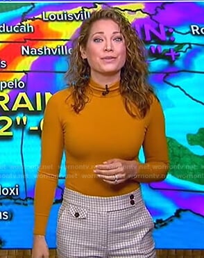 Ginger’s orange ribbed turtleneck sweater and check pants on Good Morning America