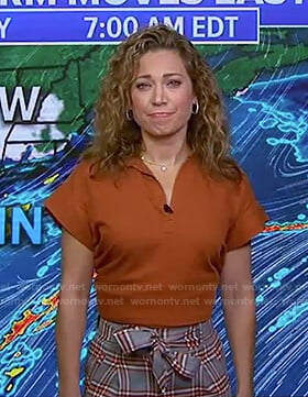 Ginger’s orange top and grey check pants on Good Morning America