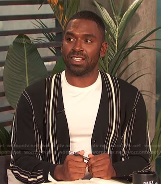 Justin’s black striped cardigan on E! News Daily Pop