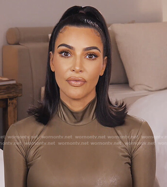 Kim’s metallic turtleneck bodysuit on Keeping Up with the Kardashians
