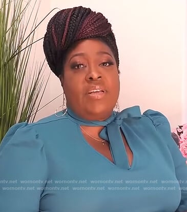 Loni’s blue tie neck blouse on The Real