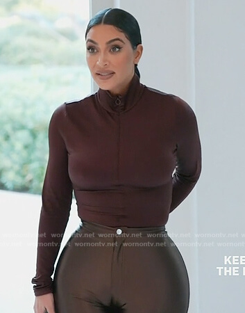 Kim’s burgundy half zip bodysuit on Keeping Up with the Kardashians