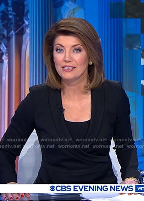 Norah’s black buttoned wrap blazer on CBS Evening News