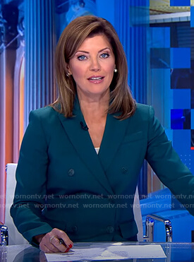 Norah’s teal double breasted blazer on CBS Evening News