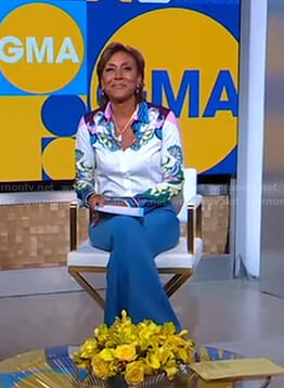 Robin’s abstract print blouse and blue pants on Good Morning America