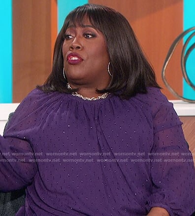 Sheryl’s purple sheer top on The Talk