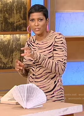 Tamron’s tiger stripe sweater and skirt on Tamron Hall Show