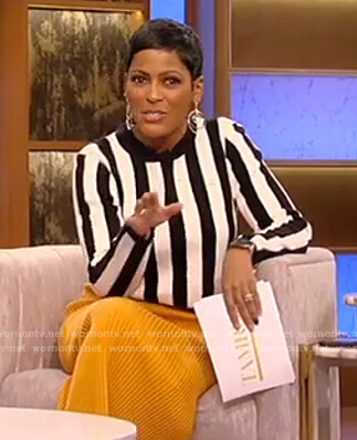 Tamron’s striped sweater and orange skirt on Tamron Hall Show