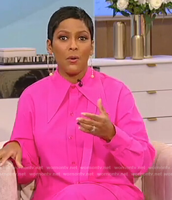 Tamron’s pink silk blouse and pants on Tamron Hall Show