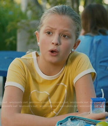 Anna’s yellow heart ringer tee on American Housewife