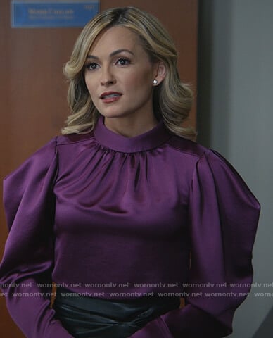 Amy’s purple satin puff shoulder blouse on All Rise