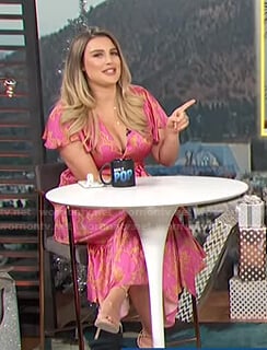 Carissa’s pink printed wrap dress on E! News Daily Pop