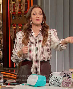 Drew's white dot print tie neck blouse on The Drew Barrymore Show