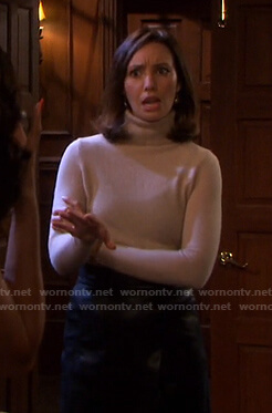 Gwen's beige turtleneck sweater on Days of our Lives