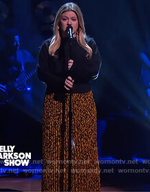 Kelly’s black button sweater and floral skirt on The Kelly Clarkson Show