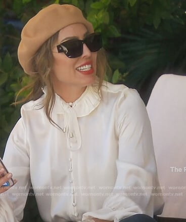 Kelly's white button front bodysuit on The Real Housewives of Orange County