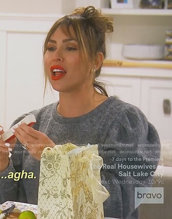 Kelly’s gray puff sleeve sweater on The Real Housewives of Orange County