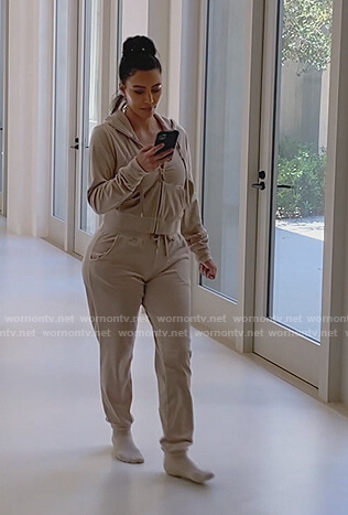 Kim's gold velour hoodie and track pants on Keeping Up with the Kardashians