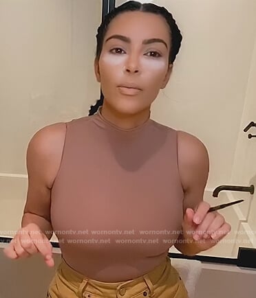Kim's beige sleeveless bodysuit on Keeping Up with the Kardashians