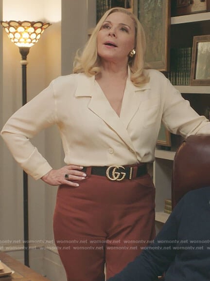Margaret’s white double breasted blouse on Filthy Rich